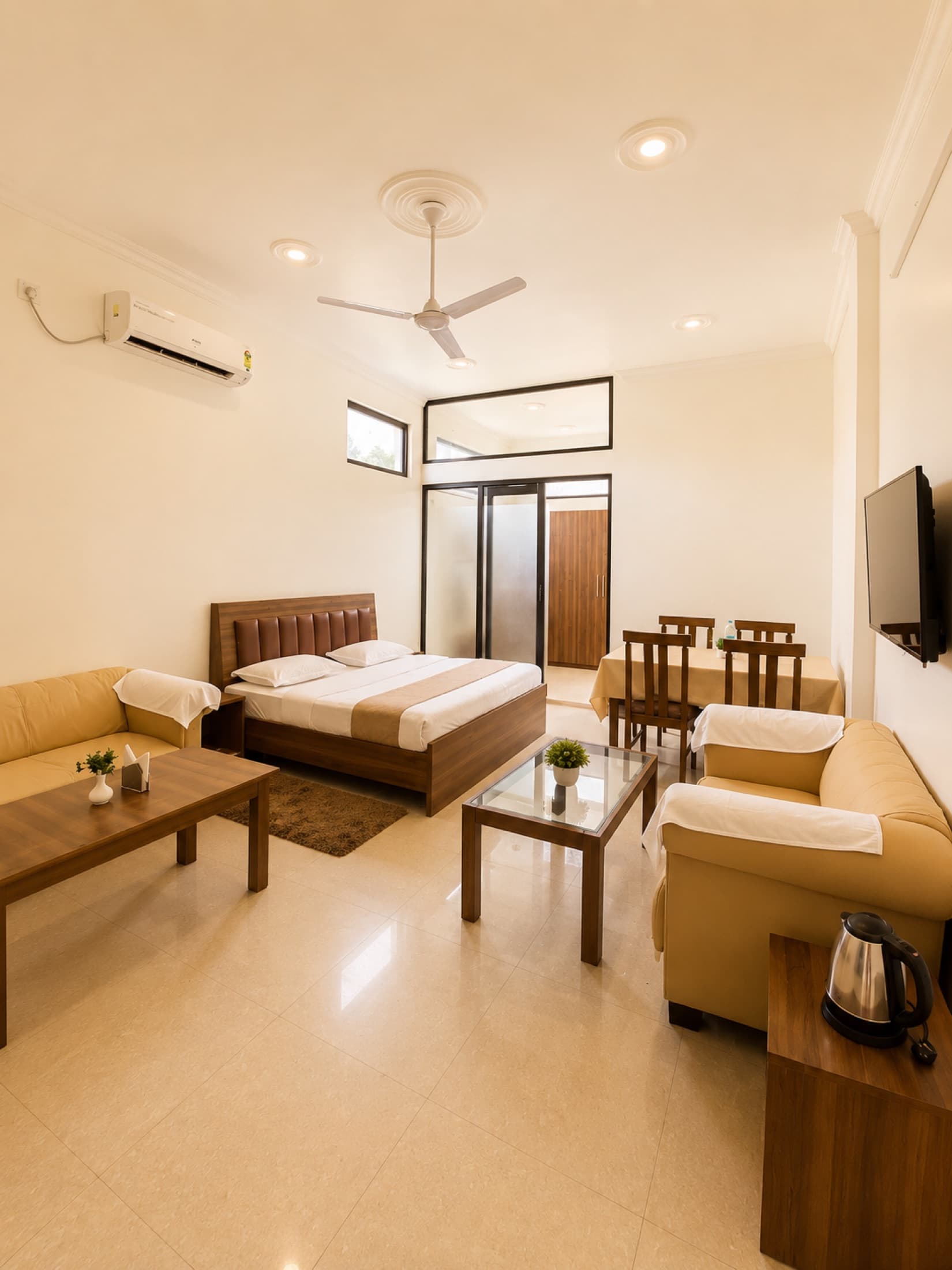 Premium Villa Room at Hotel Vasant with seating area and villa-style comfort